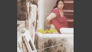 Desi aunty gets caught in the act by camera