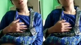 Cute Indian girl pleasures herself with her fingers