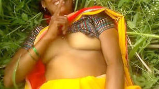 Indian village bhabhi bares her breasts in the open air