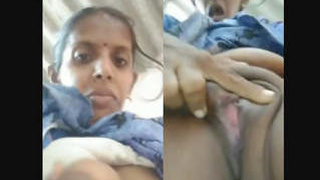 Tamil auntie flaunts her breasts and pussy in a solo video