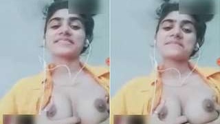 Exclusive video of a cute desi girl showing off her boobs and pussy