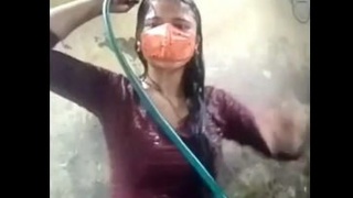 Desi teen in swimsuit takes a bath in the village