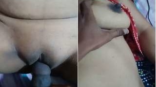 Exclusive video of a Desi bhabhi pressing her boobs and getting fucked