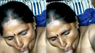 Mature aunt gives a sensual blowjob