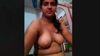Desi babe with perfect body pleasures herself with fingers