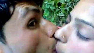Desi couple enjoys outdoor sex on a bed