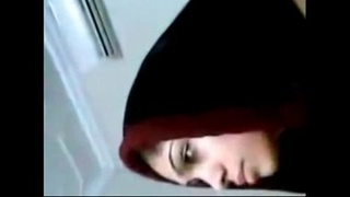 Busty college girlfriend gives a steamy blowjob to her lover