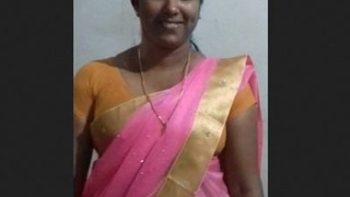 Watch Tamil Bhabhi's Big Boobs in Action