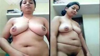 Desi female undresses in sari and lingerie to reveal her XXX-rated breasts