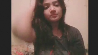 Sexy girl recording a video for her partner