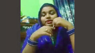 Odia babe flaunts her body and sings sensually in a solo video