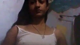 Watch a Desi girl masturbate in a solo video