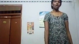 Watch this sexy Tamil auntie strip down in a solo video