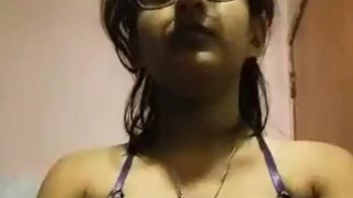 Extremely cute Indian girl stripping down to nothing