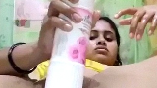 Desi's dildo play with a bottle of air freshener