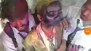 Holi celebration with classmate in colorful rubbing video