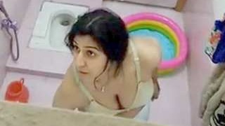 Desi bhabi baths and pees on her mother in law in lewd video