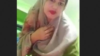 Sexy Desi wife in hijab gets naughty and shows off her body