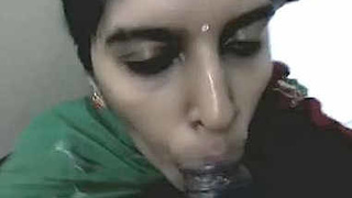 Desi aunty gives a blowjob in the office toilet