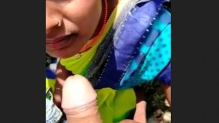 A Desi woman gives a seductive outdoor blowjob