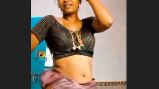 Bhabhi's sultry display in a pornographic video