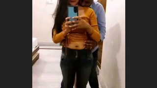 Hotel mirror brings a couple together for some sensual fingering and pussy play